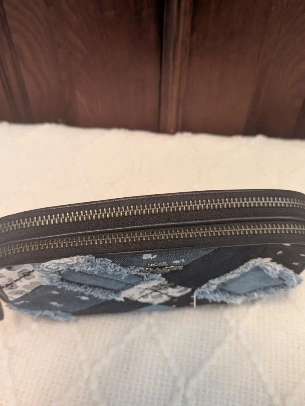 Coach frayed logo leather